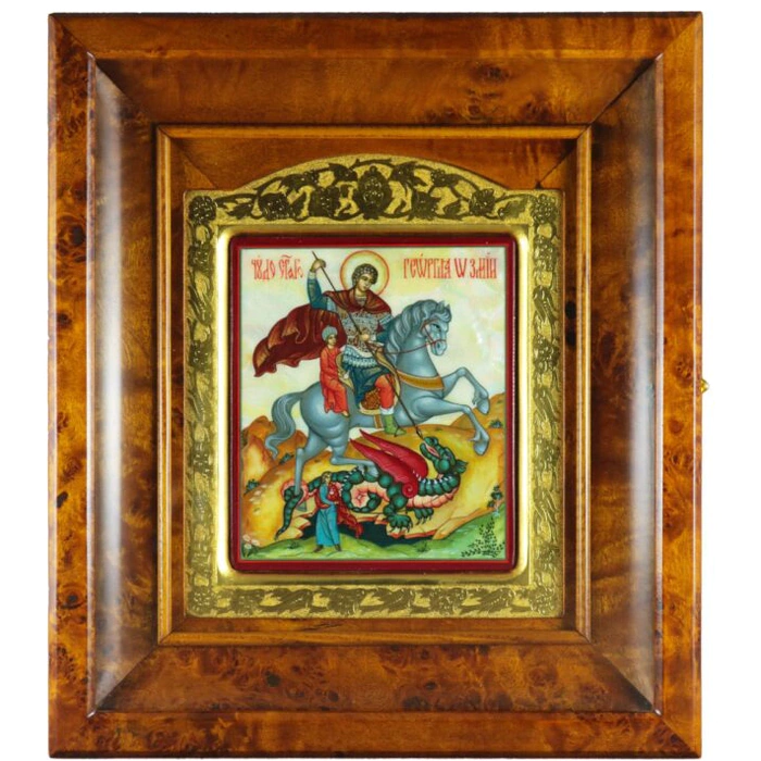 The icon of St. George the Victorious in a gold frame and a kiosk on natural mother-of-pearl
