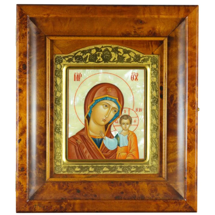 Icon of the Kazan Mother of God in a gold frame and a kiosk on natural mother of pearl