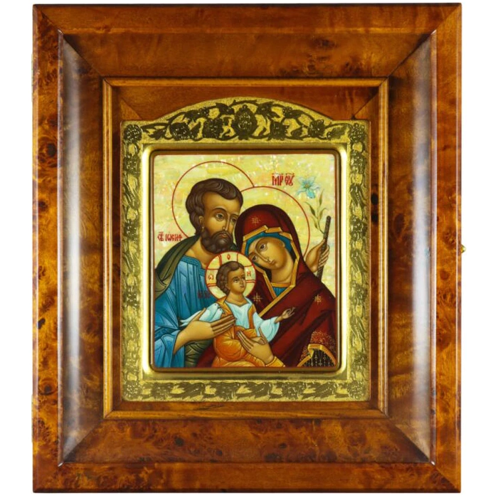 Icon of the Holy Family in a gold frame and a kiosk on natural mother-of-pearl