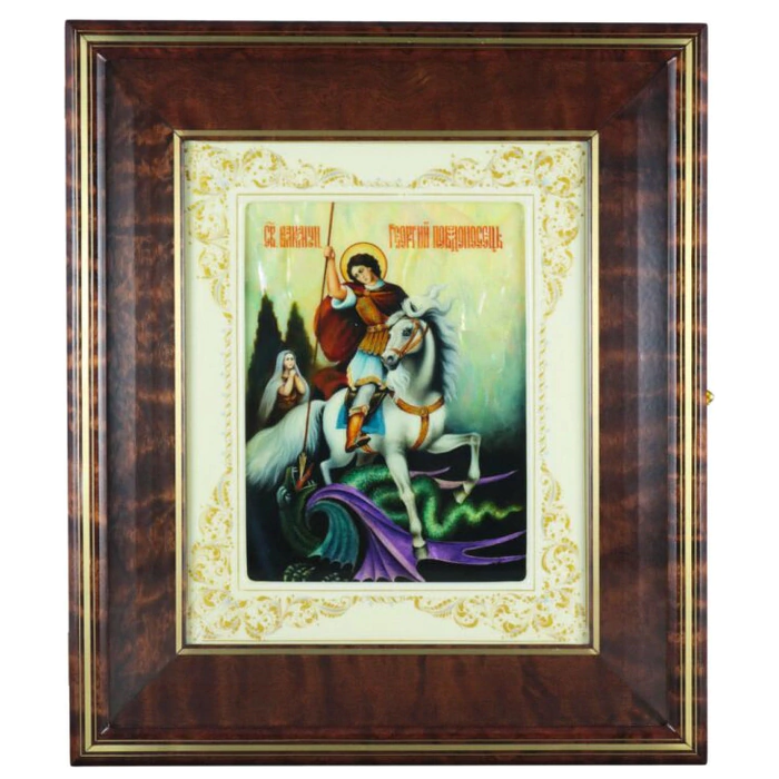 The icon of St. George the Victorious in a white frame and a kiosk on natural mother-of-pearl