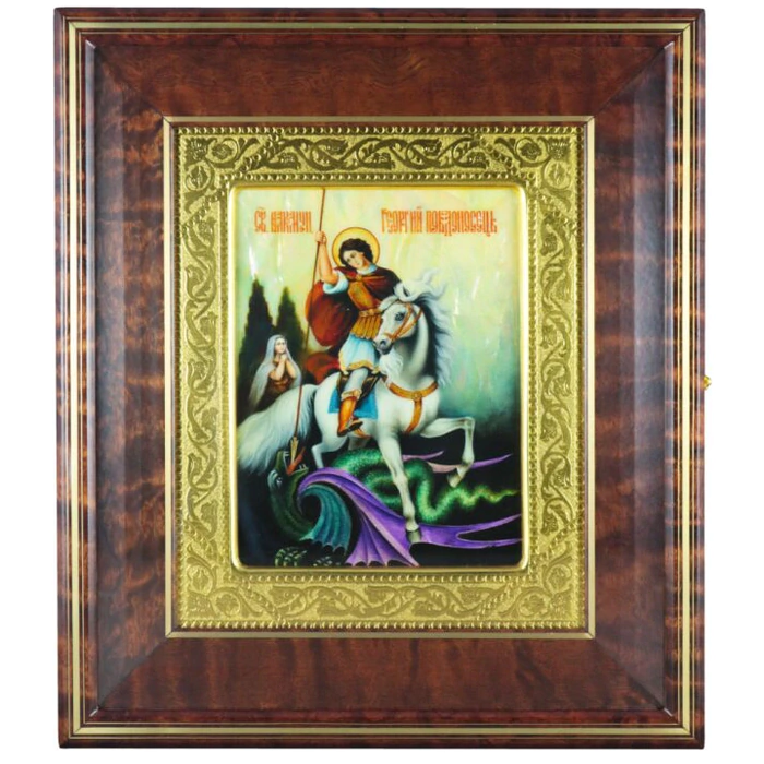 The icon of St. George the Victorious in a kiosk and a gold frame on natural mother-of-pearl