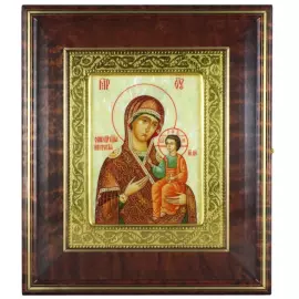 Icon of the Iverian Mother of God in a kiosk and a gold frame on natural mother of pearl