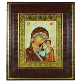 Icon of the Kazan Mother of God in a kiosk and a gold frame on natural mother of pearl