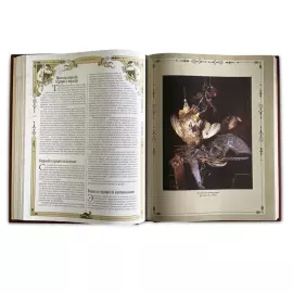 The leather-bound book "The Big Book of Russian Hunting" by L.P. Sabaneev.