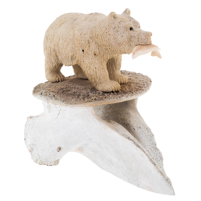 Sculpture of mammoth tusk and whale bones "Fisherman Bear"
