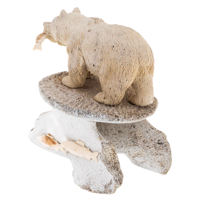 Sculpture of mammoth tusk and whale bones "Fisherman Bear"