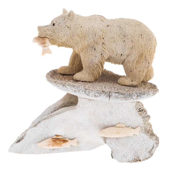 Sculpture of mammoth tusk and whale bones "Fisherman Bear"