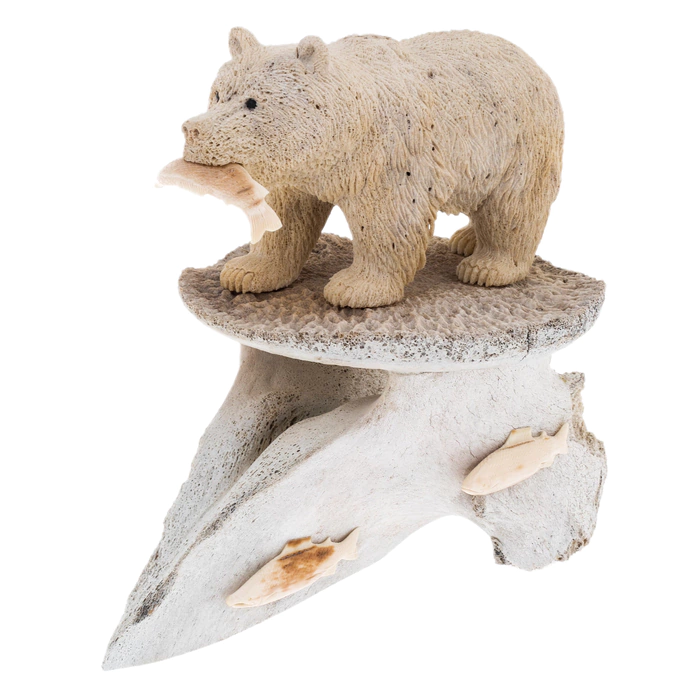 Sculpture of mammoth tusk and whale bones "Fisherman Bear"