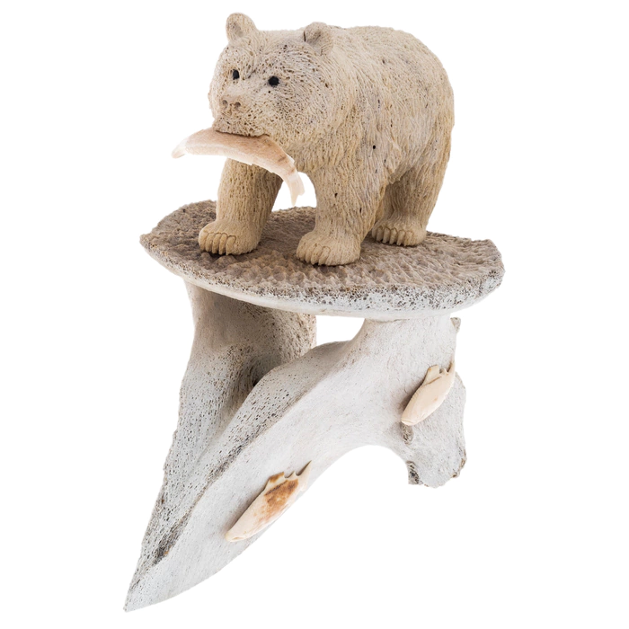 Sculpture of mammoth tusk and whale bones "Fisherman Bear"