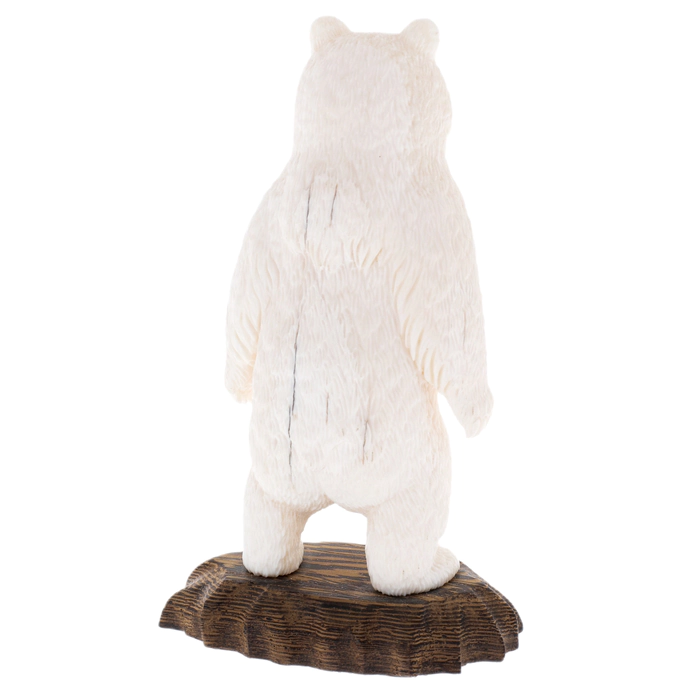 Sculpture of a walrus tusk "Bear" on a stand