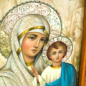 The icon of the Virgin of Kazan wedding with stained glass enamels
