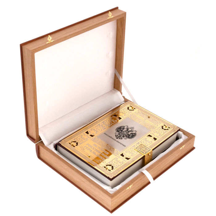 A leather-bound book and a salary "The History of Russian heraldry" in a box, Zlatoust