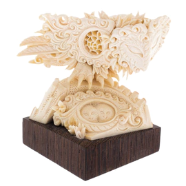 Highly artistic sculpture "Owl" made of mammoth tusk