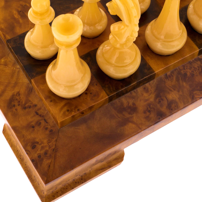Cap chess with amber pieces