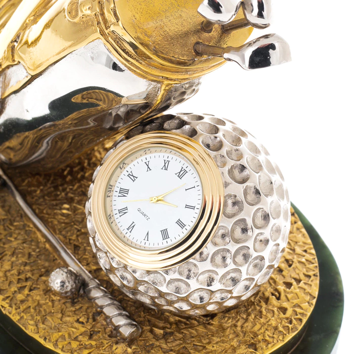 A pen holder with a watch "Golfer's Backpack" on a jade stand