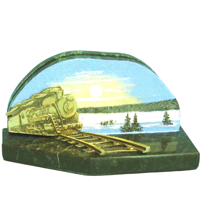 A business card holder made of bronze and a coil "Magistral"
