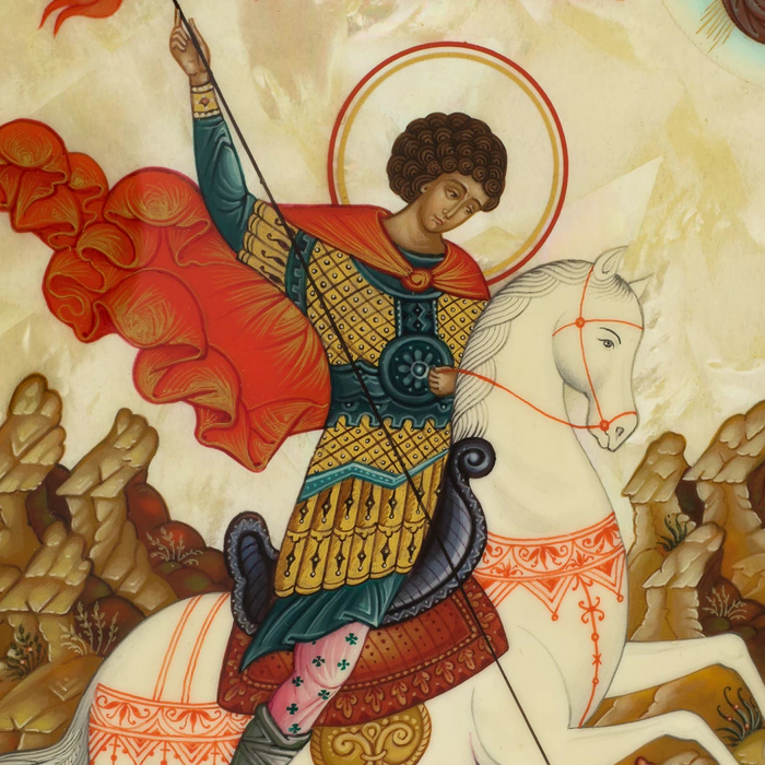 The icon of St. George the Victorious on natural mother-of-pearl in a gold frame