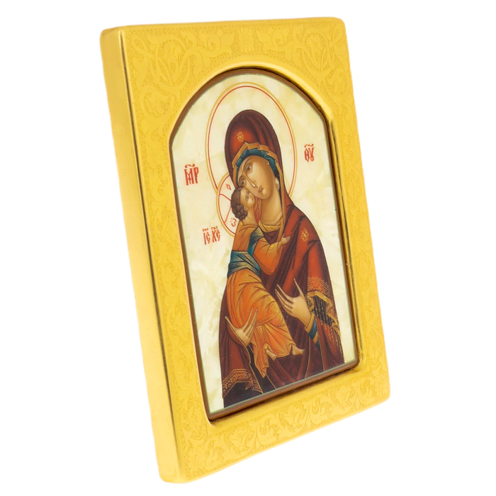 Mother-of-pearl icon of the Vladimir Mother of God in a gold frame with embossing