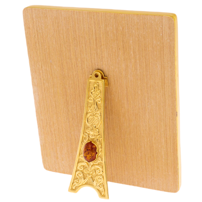Mother-of-pearl icon of the Vladimir Mother of God in a gold frame with embossing