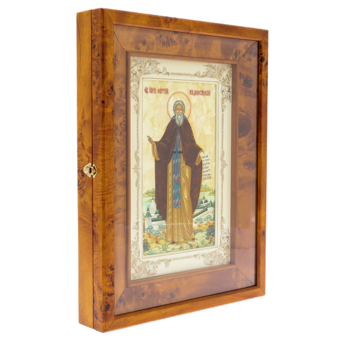 The icon "Sergius of Radonezh" on natural mother-of-pearl in a kiosk and a white frame