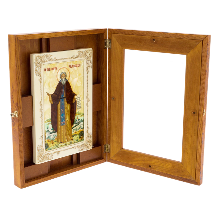 The icon "Sergius of Radonezh" on natural mother-of-pearl in a kiosk and a white frame