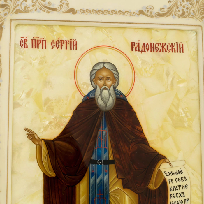 The icon "Sergius of Radonezh" on natural mother-of-pearl in a kiosk and a white frame