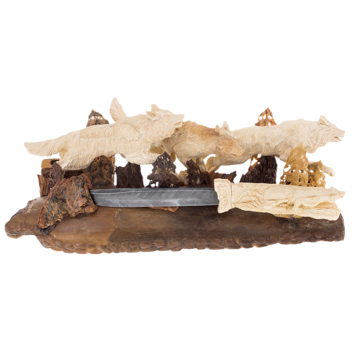Mammoth tusk sculpture "Wolves" with a knife