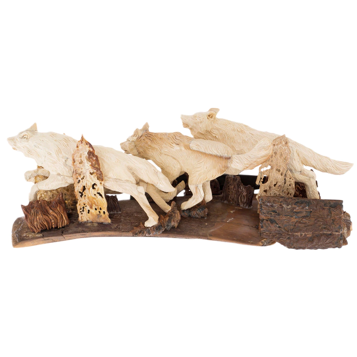 Mammoth tusk sculpture "Wolves" with a knife
