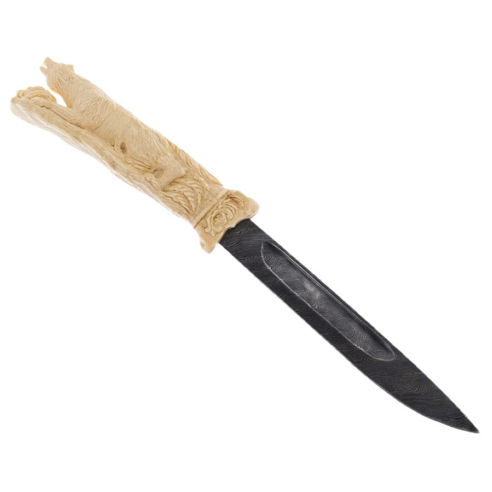 Mammoth tusk sculpture "Wolves" with a knife