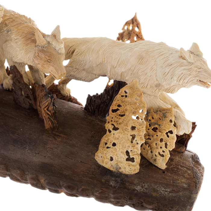Mammoth tusk sculpture "Wolves" with a knife