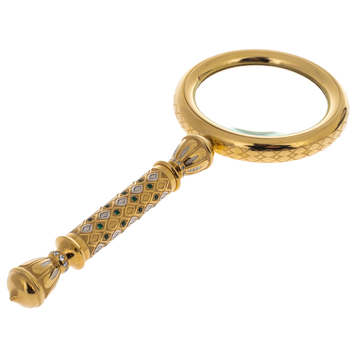 Magnifying glass with stones