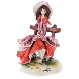 Porcelain statuette "Little lady on the bench" red