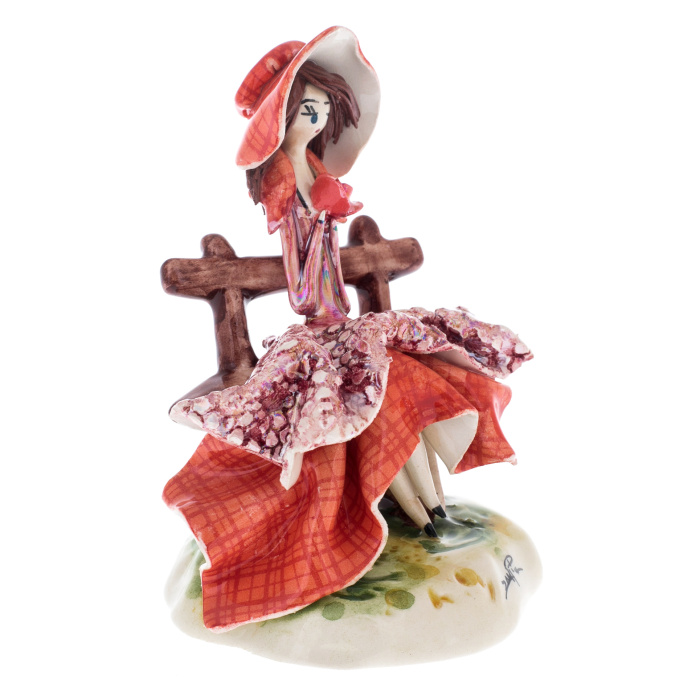 Porcelain statuette "Little lady on the bench" red