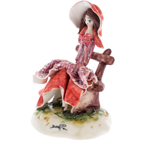 Porcelain statuette "Little lady on the bench" red