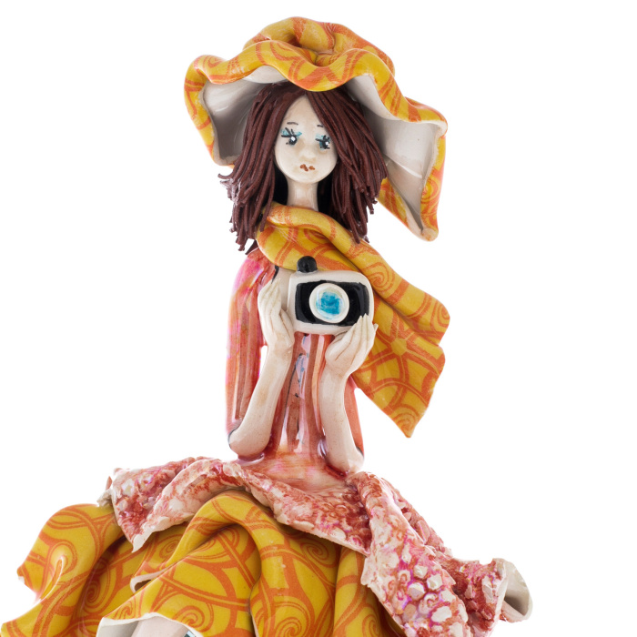 Porcelain figurine "Tourist" orange