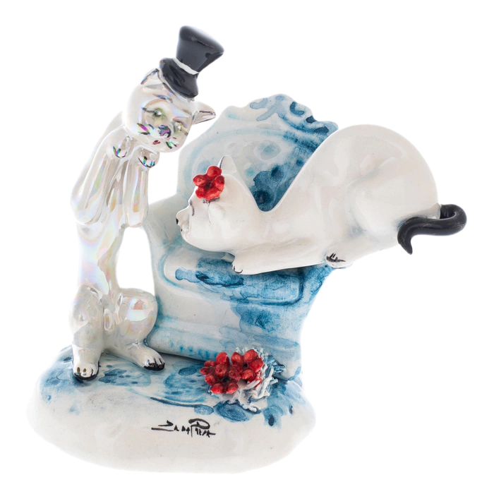 Porcelain statuette "A pair of cats on a chair"