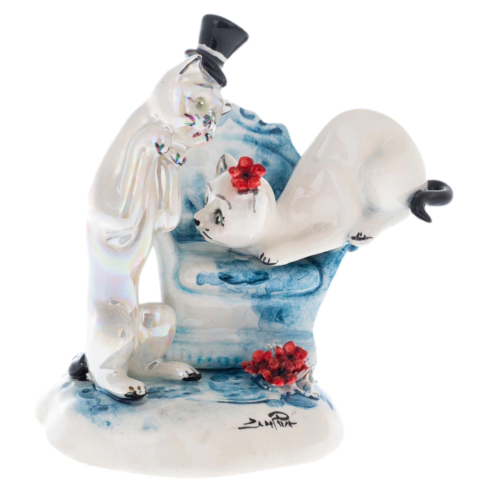 Porcelain statuette "A pair of cats on a chair"