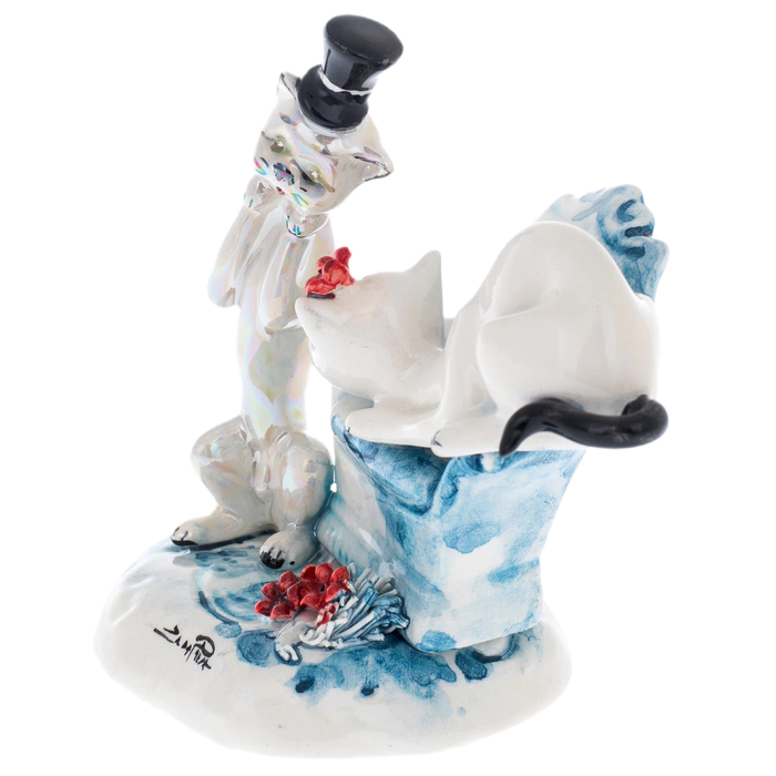 Porcelain statuette "A pair of cats on a chair"