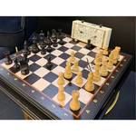 A chessboard or a clock with an autograph and a personal address of chess player and politician Anatoly Karpov.