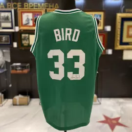 An autographed T-shirt by basketball player Larry Bird