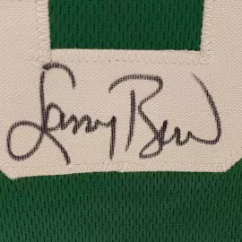 An autographed T-shirt by basketball player Larry Bird