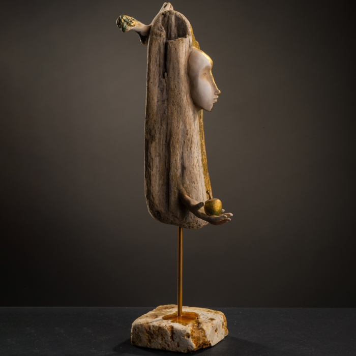 Author's sculpture made of wood "Angel with an apple"