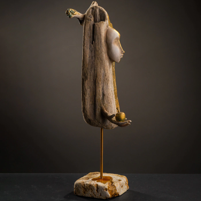 Author's sculpture made of wood "Angel with an apple"