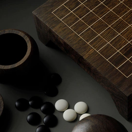 Set for playing Go made of stained oak "Morwood" with brass