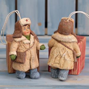 Collectible Christmas tree toy "Kid with a bag" from the collection "Russian North"