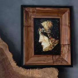 Wood and amber panel by Lucien de Sevola "The head of a lady in a medieval costume"