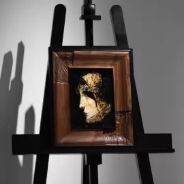 Wood and amber panel by Lucien de Sevola "The head of a lady in a medieval costume"