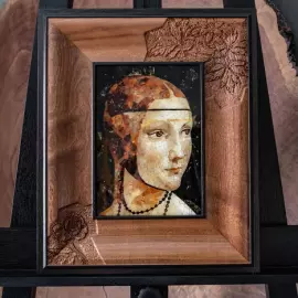 Leonardo da Vinci's wood and amber panel "The Lady with the Ermine"