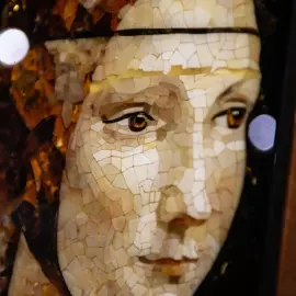 Leonardo da Vinci's wood and amber panel "The Lady with the Ermine"