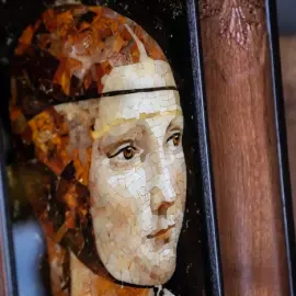 Leonardo da Vinci's wood and amber panel "The Lady with the Ermine"